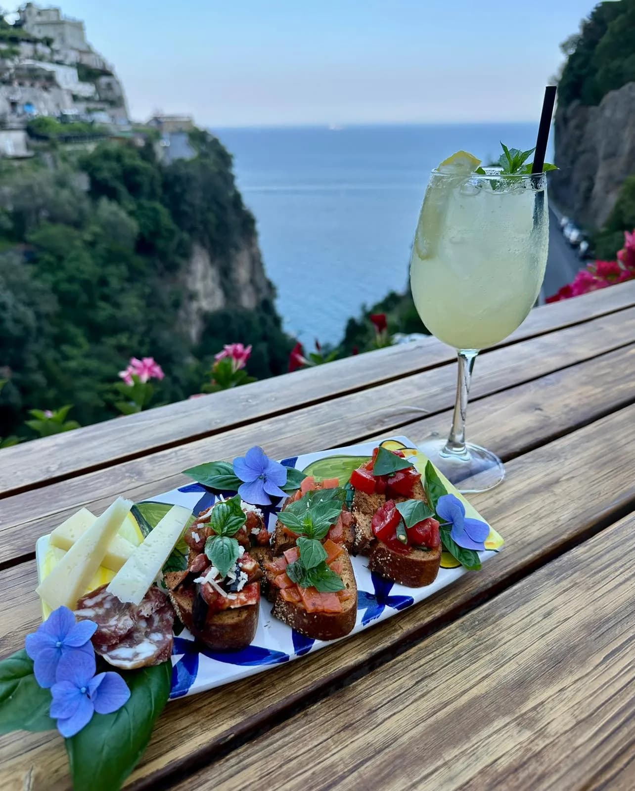 Limoncello aperitivo with panoramic Amalfi Coast view