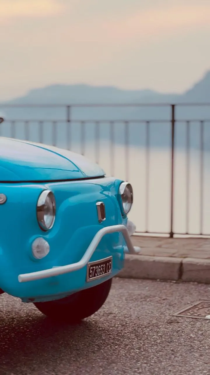 Front view of the vintage Fiat 500 Jolly at a panoramic viewpoint