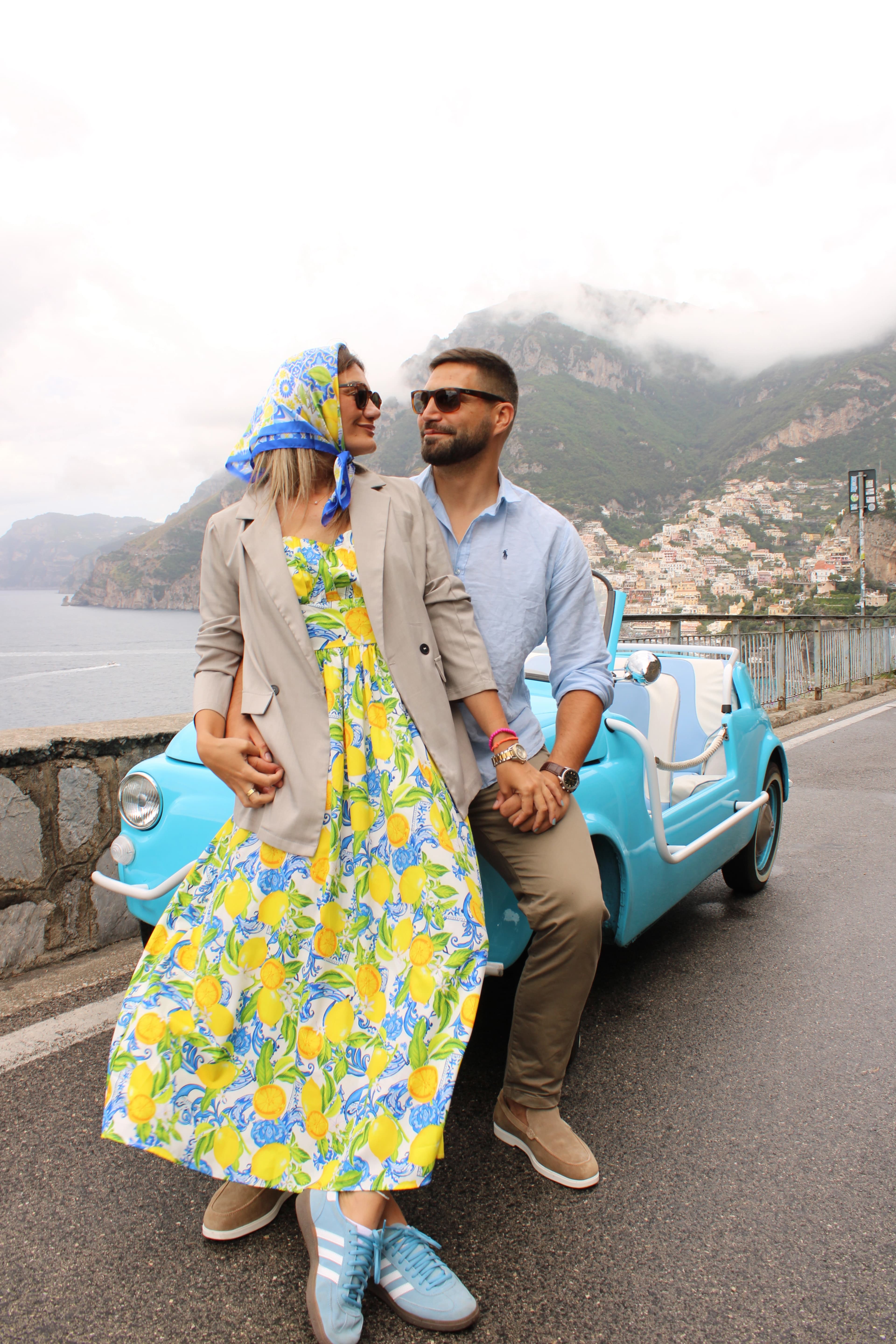Group photo in the open-top Fiat 500 Jolly with Amalfi Coast backdrop