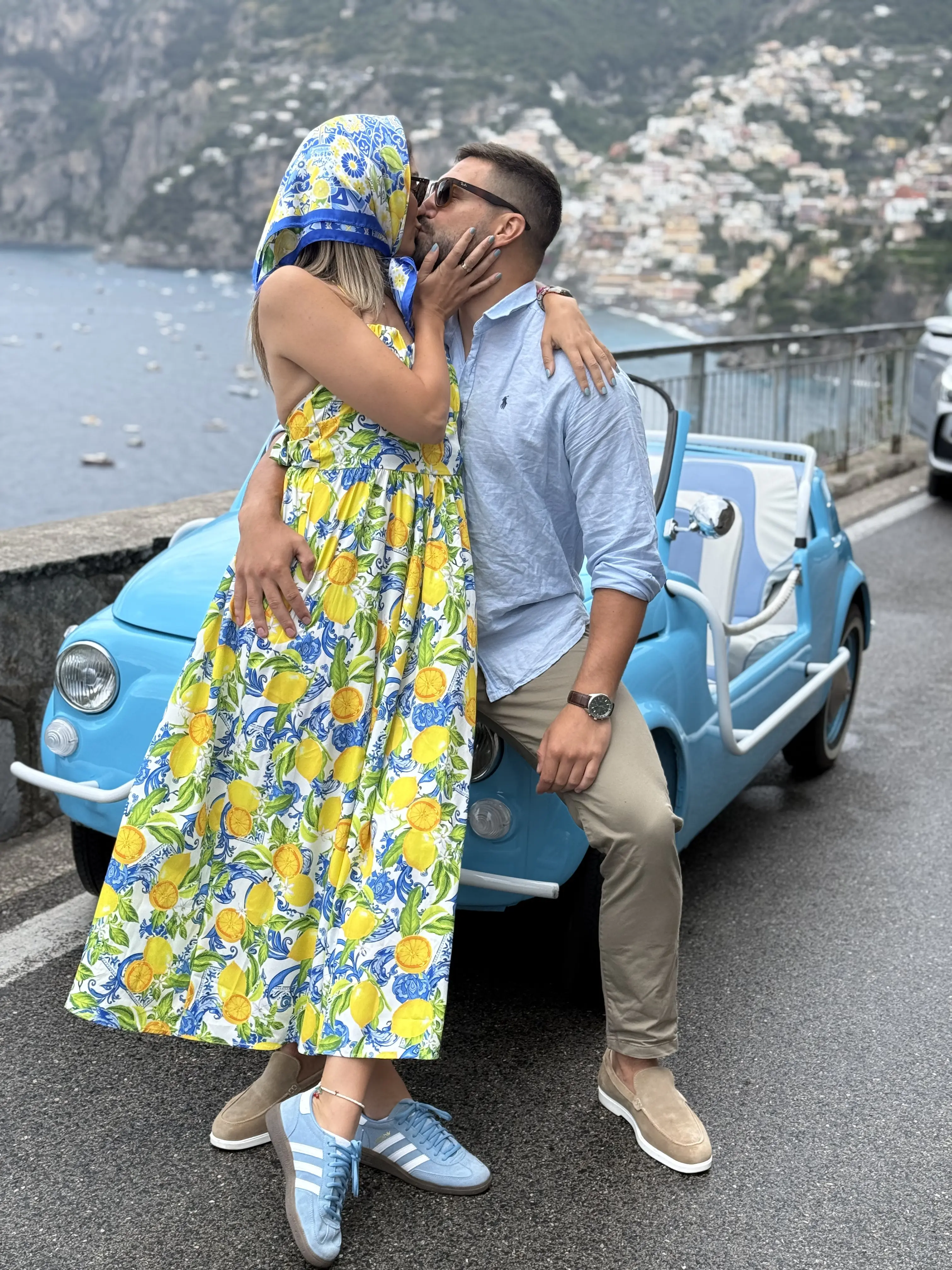 Group photo in the open-top Fiat 500 Jolly with Amalfi Coast backdrop